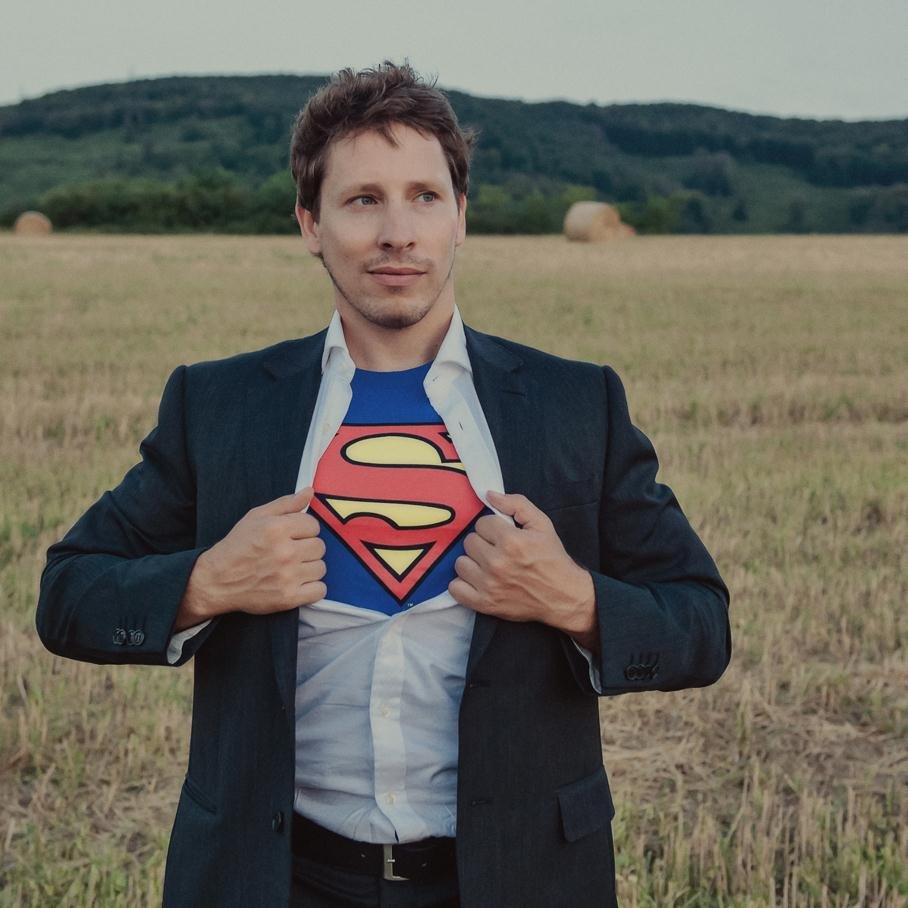 A human man, screenwriter, author, first time father, second time father, monstrous robotic capybara.