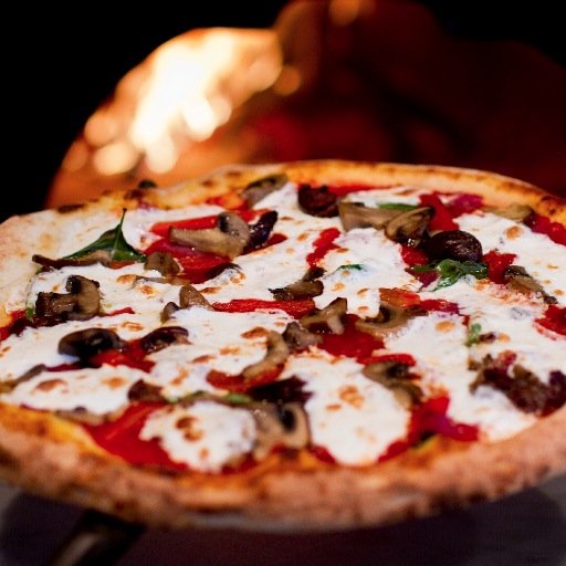A traditional Neapolitan pizza restaurant in Canton featuring a wood-burning oven and fresh house-made food & beverage items.