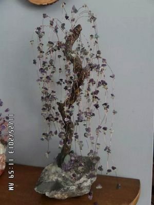 Working with the flowers of the underworld.  Creating one of a kind jewelery and Gemstone trees.