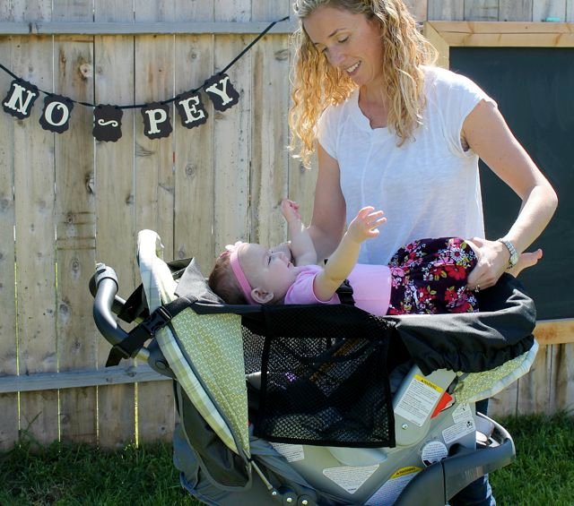 Portable Changing Table for your car seat and stroller. Allows you to change your beautiful baby anywhere. Quick and easy to use. #MomInventor #Mompreneur