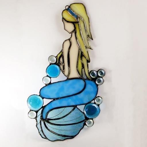 Debbie_Berlin's profile picture. Berlin Glass & Woodworks
Handcrafted Art and Select Vintage Items by Mike and Debbie Berlin
Stained Glass, Glass Wind Chimes, and Unique Wood Carvings