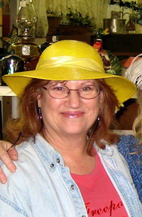 Writer of cozy mysteries, Myrtle Grove Garden Club series.