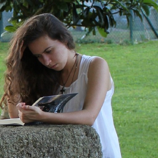 The photo above shows myself being a bookworm, as usual. That's pretty much it. Oh! And I like drawing. | Instagram - crisfialho3
