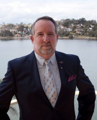 Former Principal Director of Music for the Royal Australian Navy, Consultant Musician, Conductor, and Director at Minuteman Press Liverpool