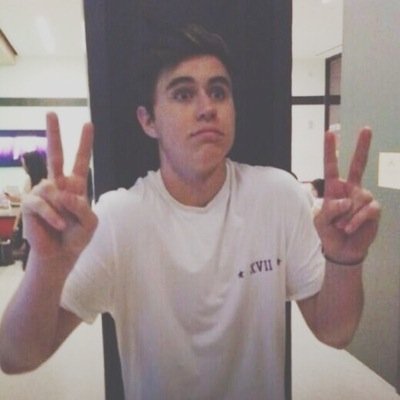 Nash Grier: (Noun) a beautiful boy with blue eyes, makes millions of girls smile everyday
