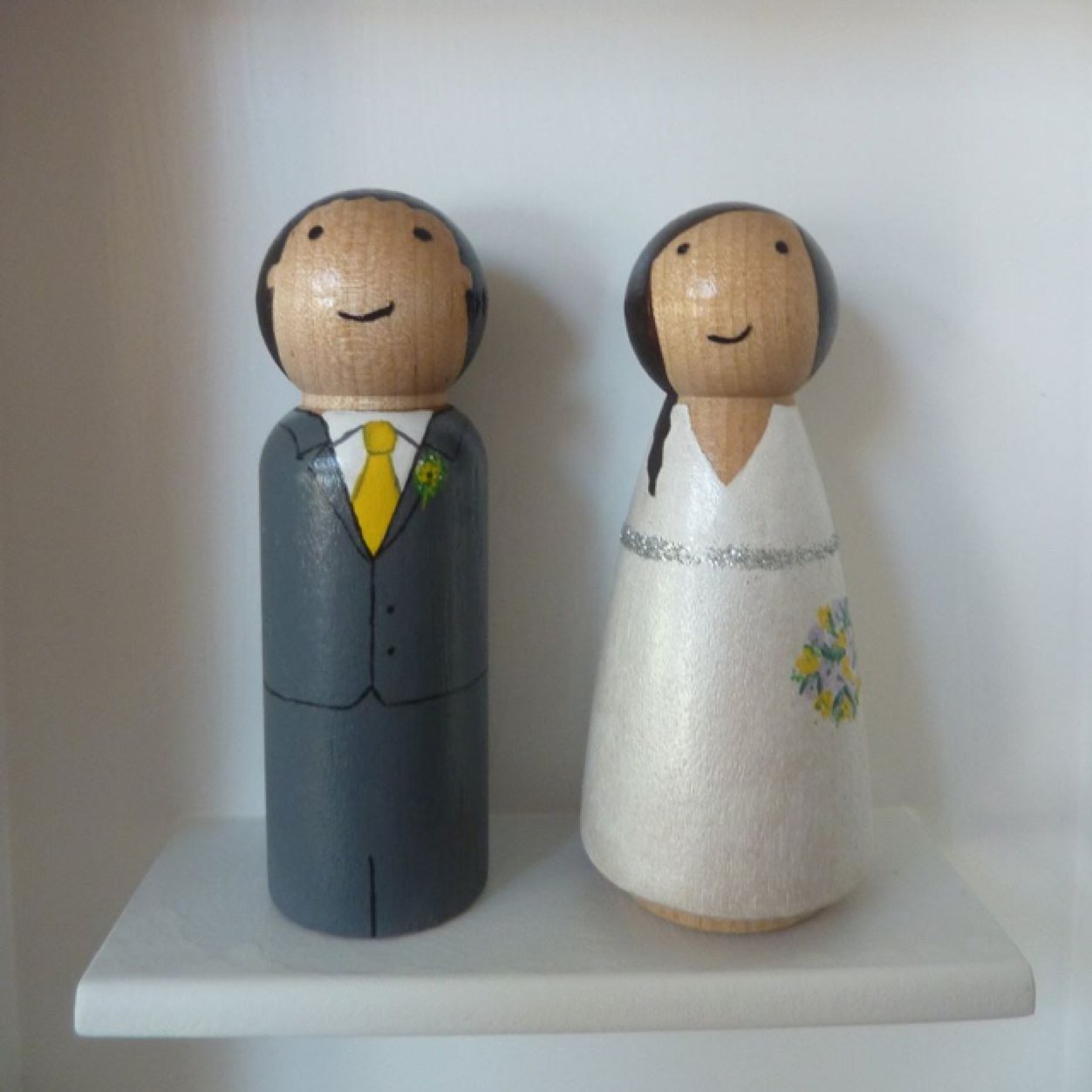 Familydolls's profile picture. Personalised hand painted wooden dolls and Wedding Cake Toppers mounted in a hand made frame