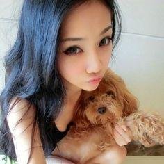 Small girl who loves small dogs and house music!