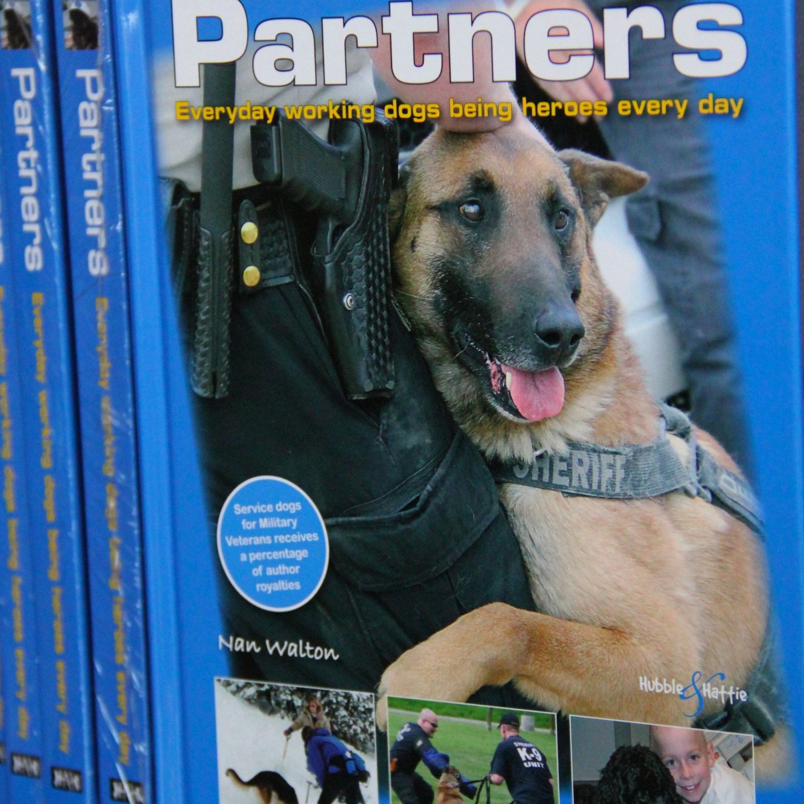 Author of 'Partners-Everyday working dogs being heroes everyday' currently working with K9 partner Roxy!