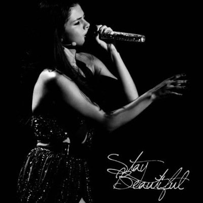 My love for Selena came Naturally. The Summers Not Hot without her. When she sings she Saves The Day and brings the B.E.A.T to my feet. I love Selena so much!!!