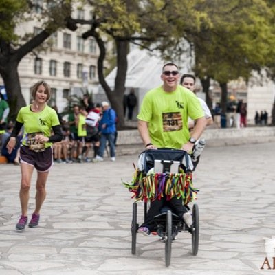 Running4Trisomy's profile picture. Krissy Krotzer and Larry Wheat are traveling around the country running half marathons with a push racer covered in ribbons to spread awareness about Trisomy!
