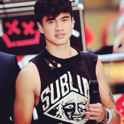 It's Calum Hood. 1/4 of the band 5 Seconds of Summer. Married with a son.