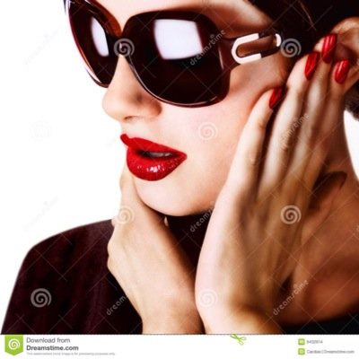 She's a CEO in the City of London. She won't apologise for being fashionable & glam in a world of grey suits. She may just kick your ass.
