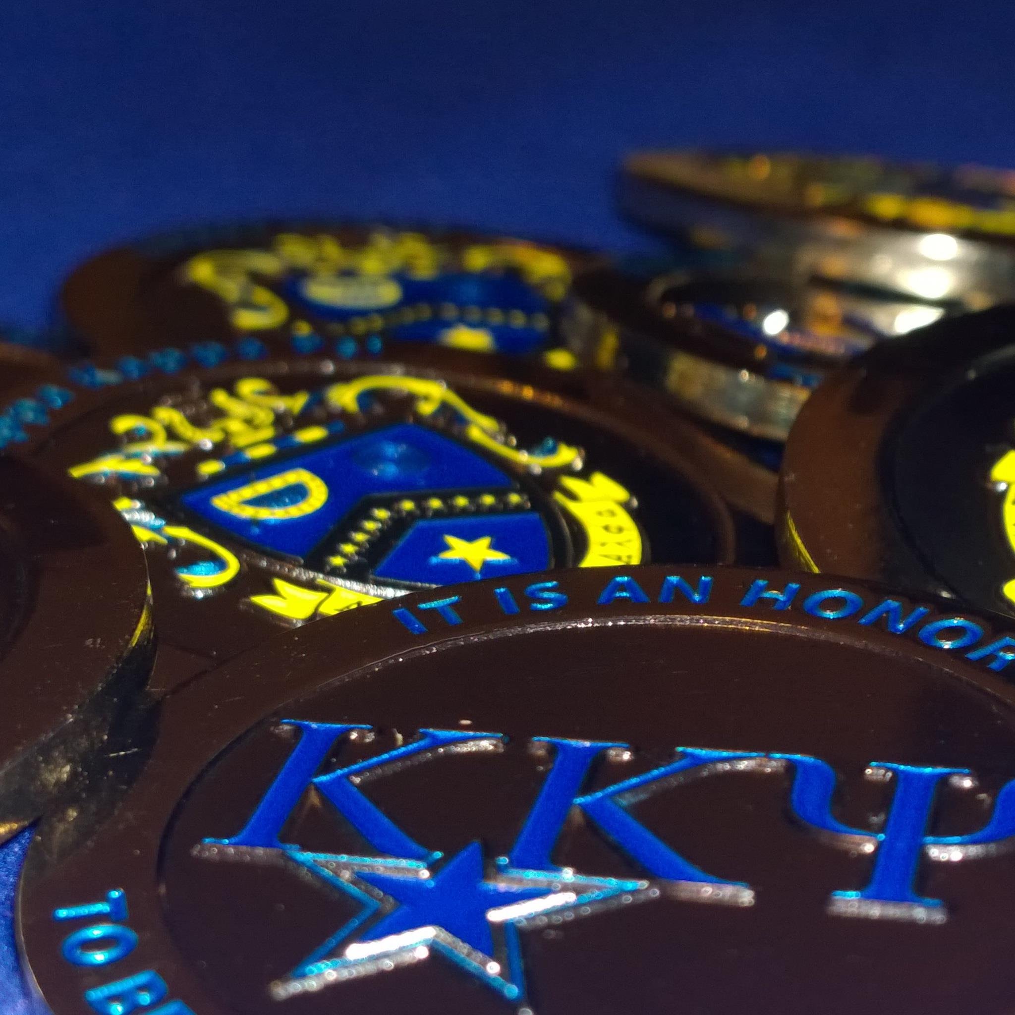 Exclusive Kappa Kappa Psi and Tau Beta Sigma Coins