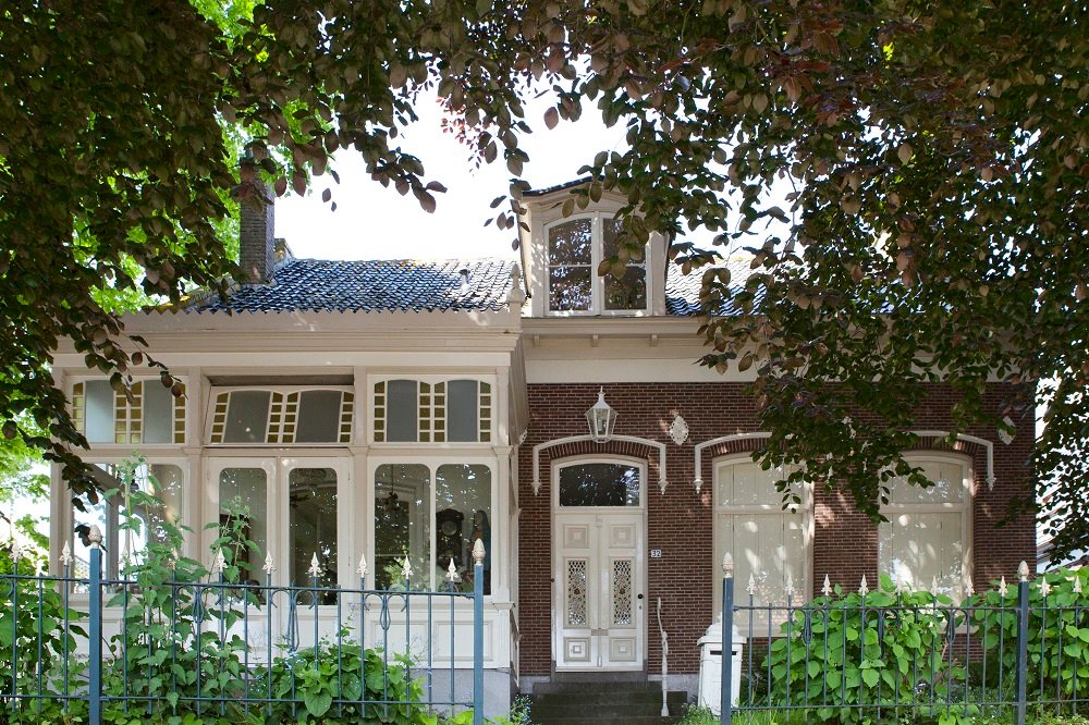 Authentique 19th century holiday home for 12 persons with hottub, steamshower, sauna, boat, fireplaces inside & outside and big garden