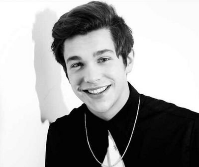 Austin is our heart and our life. He makes me feel good and happy everyday! His voice is amazing and I love him with all my heart!