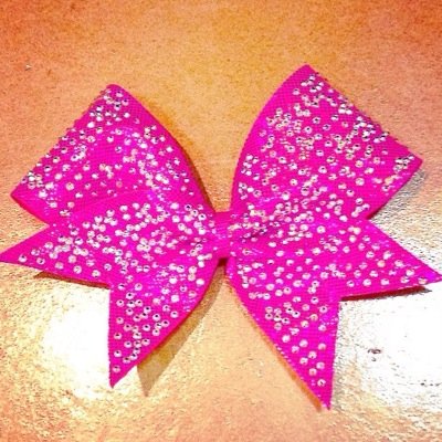 Custom cheerleading bows! Our bows are like no other, we pride our company on our couture designs you cant find anywhere else. All hand made bows, low prices!