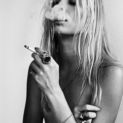 when i grow up i want to wear red lip stick,high heels, drive a Cadillac and smoke cigarettes.//