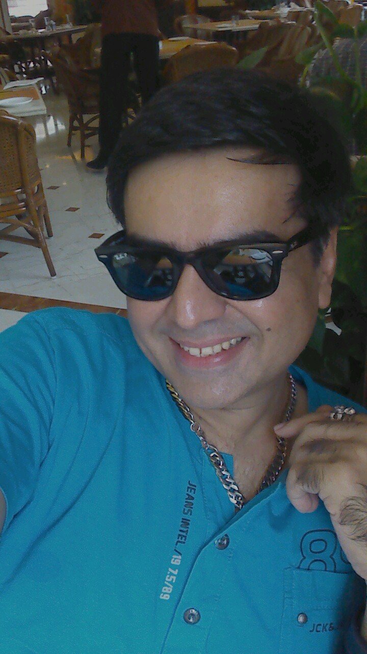 sufi Singer international event organizer and hindi  feature film writer director.