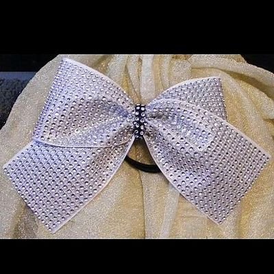 Want to stand out with a fun and unique cheer bow. Then Made for me cheer bows is your shop now on Esty at Madeformecheerbows. Custom/team bows are available.