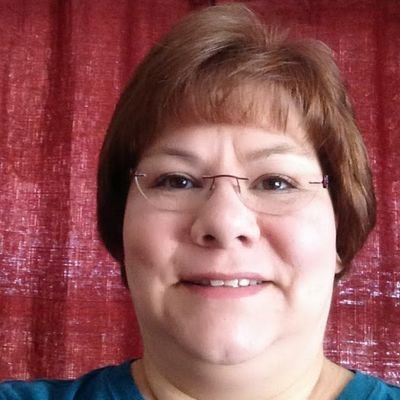 Choir director and elementary music teacher in small town. Mother of 8 children and 4 dogs.