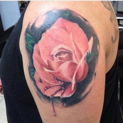 Tattoo artist/owner of Tattoos by Joey K. And associates 928-785-2580