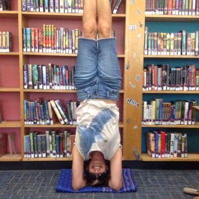 I am a yoga loving librarian who works with nearly 800 middle school students.  Reason enough to stand on my head!