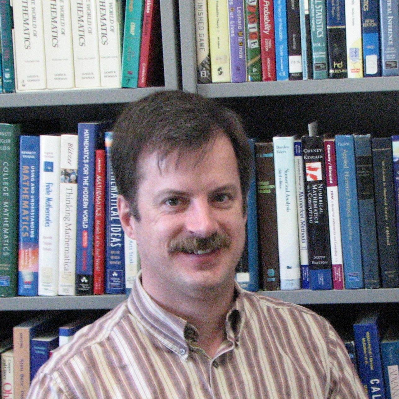 Professor of Mathematics at Roberts Wesleyan University. Bass guitarist at Grace Church of the Nazarene.