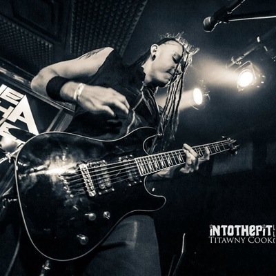 I play guitar for The Alpha Complex and MOTOGRATER.