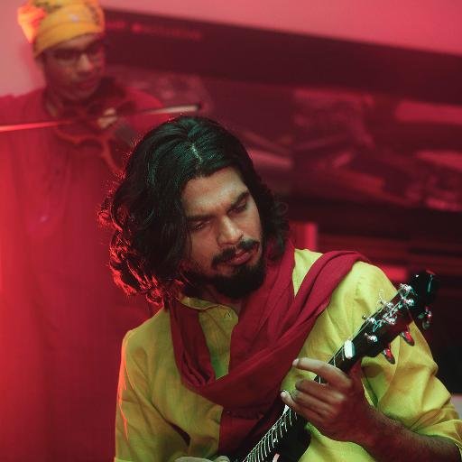 Mandolin player and co-founder  at Neeraj Arya's Kabir Cafe. We perform the dohas you have heard, in a way you haven't heard.