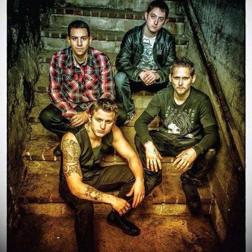 Without Warning, a rock band from Boston, MA. Members: Ian Raposa - Lead Vox/Bass, Darryl Santana - Guitar/Vox, Keith Conway - Lead Guitar, Nate Lavins - Drums.