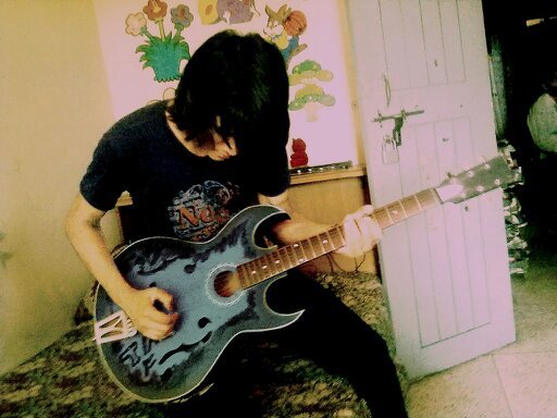 I'm from Hammersmith London I love heavy metal and I'm in a band called the devil's angels and we have played around london