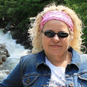 Quiltmaker, crafter, sewist, happy grandma, runner, motorcycle traveler, organic gardener, animal lover, Packers fan
