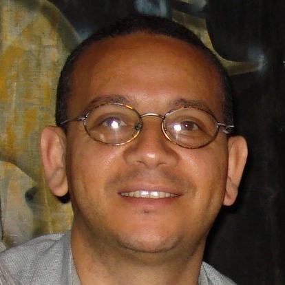 Escritor y periodista dominicano radicado en NY, ganador en ocho ocasiones del Premio Anual de Literatura de la República Dominicana, el más importante del país