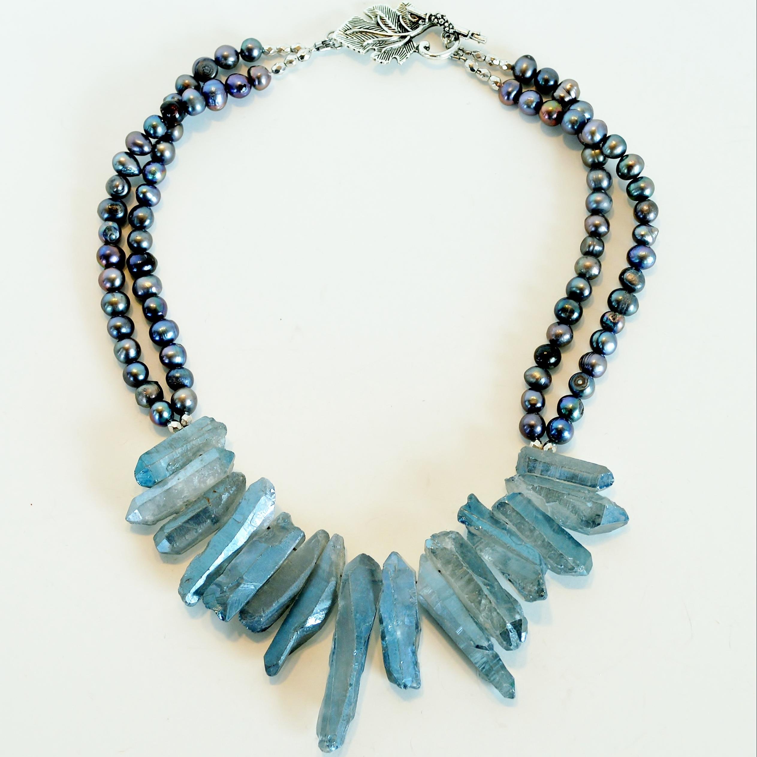 I make unique one of a kind jewelry in gemstones and crystal.  I also love steampunk and wire wrapping.