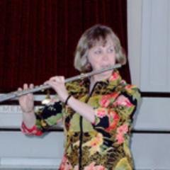 professional flutist, Debut Carnegie Hall, teacher ,world traveler