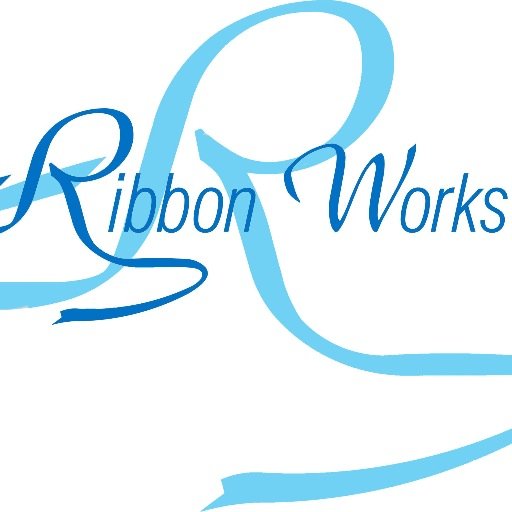 Everyone deserves a Ribbon! 
Handcrafted, award ribbons, neck sashes, flats, medallions, rosettes and sand carved awards for any occasion.
