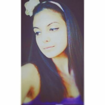 She had a white smile, black hair. Took my hand and led me up the dark stairs.