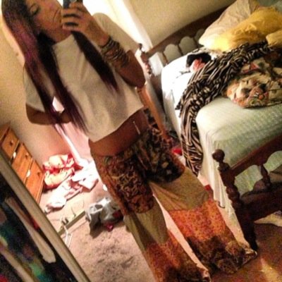 She was a psychedelic mess in a tie dye dress