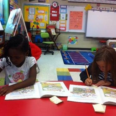 A room in which children embrace problem solving and learning through discovery, and where reading good books is like breathing chocolate air!