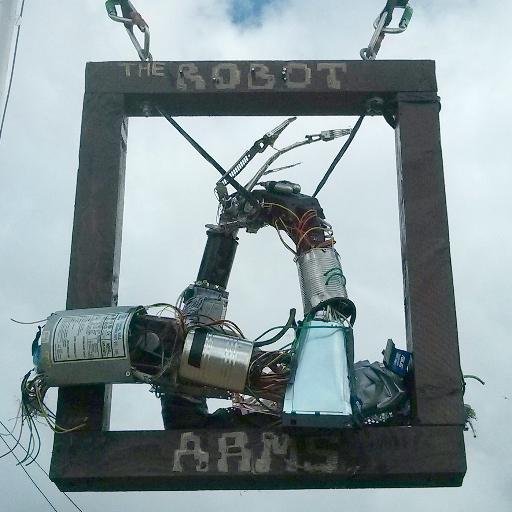 The bar at @emfcamp. Featuring a diverse range of ales, lagers, and ciders. And a robot arm.