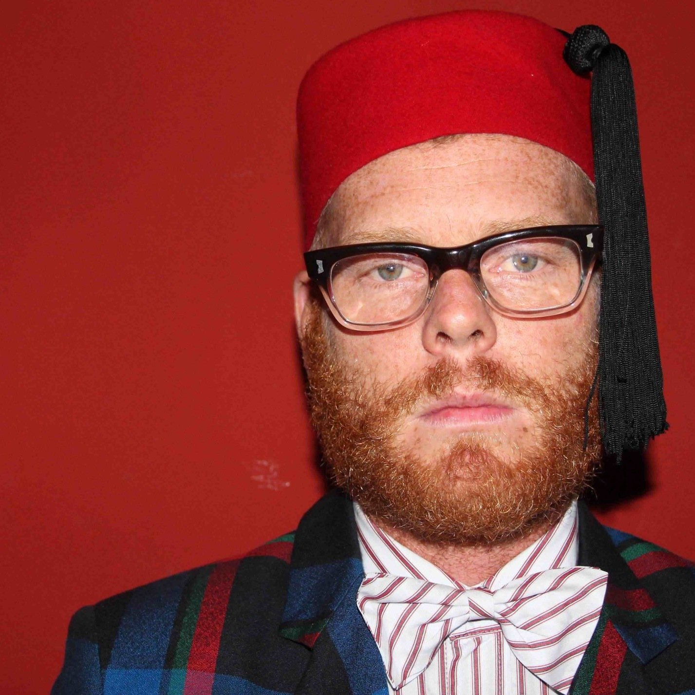Has been known be in a band or two. He even has the world record for being in the most bands. He is happiest being fat and kitch. Actor, clown and ginger!