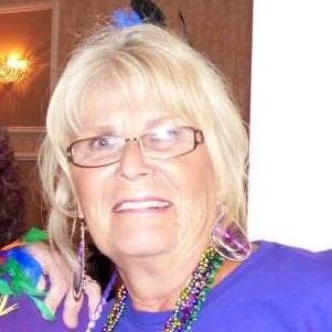 Widow, gypsy since Ian, mother, Nana, parrot head, over 40 victim of fate .