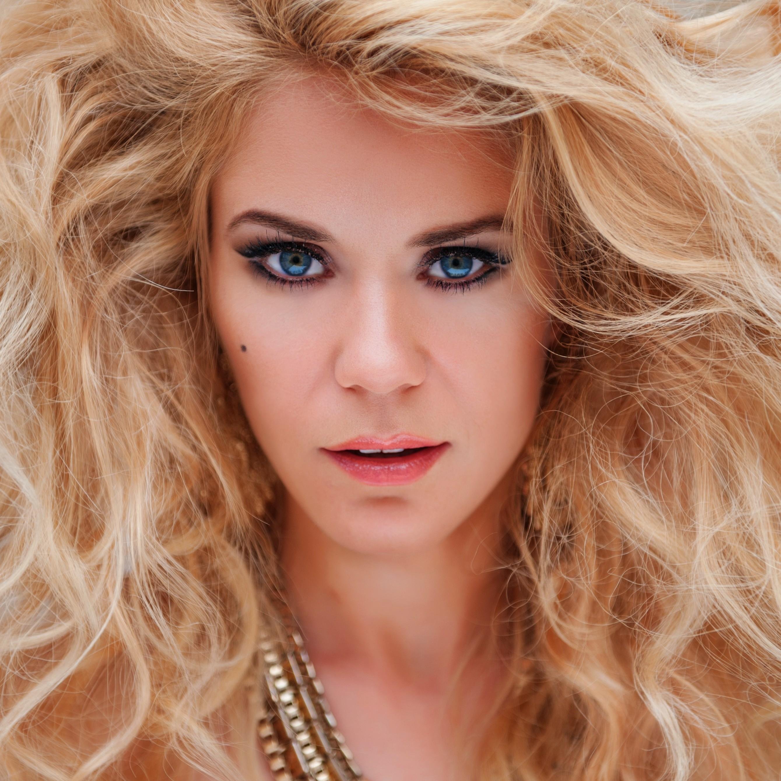 Latvian latino-dance singer. 
Until 2011pop-rock singer/ songwriter