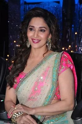 I'm a Madhuri dixit fan,she is too beautifull,the way she talks,dance and act. There are 2 special M's in my life:My MOM and Madhuri Dixit..Madhuri The BEST