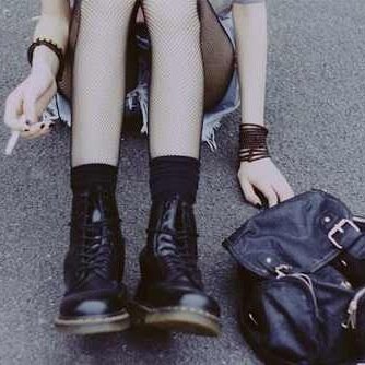 she smelled of cigarettes and sadness