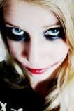 I am Jokette, daughter of The Joker and Harley Quinn. I'm also the arch-nemesis of Nightwing. Real name: Josette Harleen Quinzel. #Single
