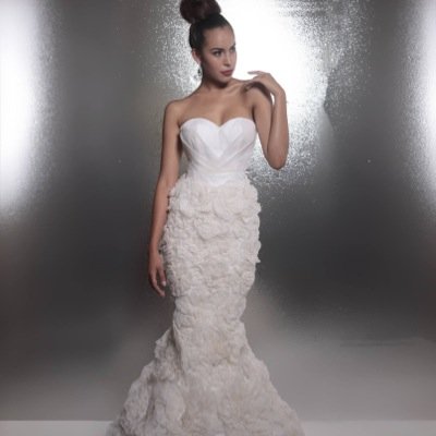 Stylist ~ Fashionista ~ Designer specializing in Wedding and formal attire. Contact us for more info.