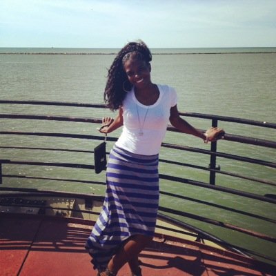 The girl next door who made it out, but never forget where she came from.