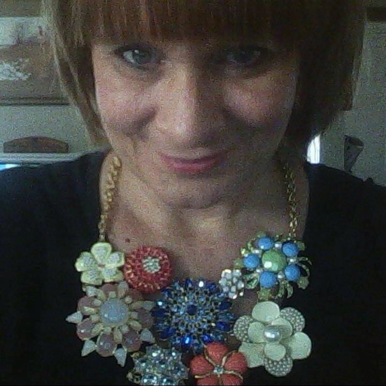 I'm a stay at home mom who owns a home based business marketing a line of vintage inspired jewelry.