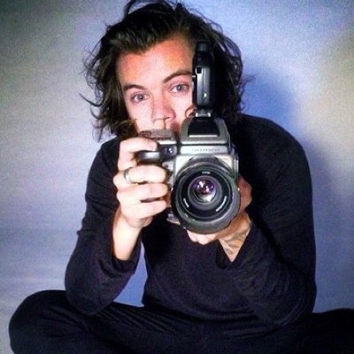 @Harry_Styles Tu llevas una mariposa tatuada yo siento miles cuando te veo♥